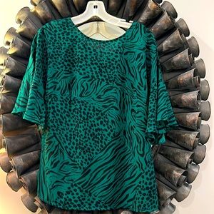 Cabi XS blouse. Ties in back.